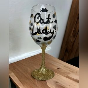 Hand painted Cat Lady Wine Glass.Painted black and gold with gold glitter stem.